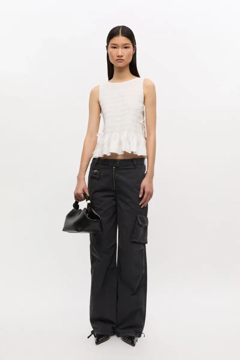 Witte katoenen smocktop met strik