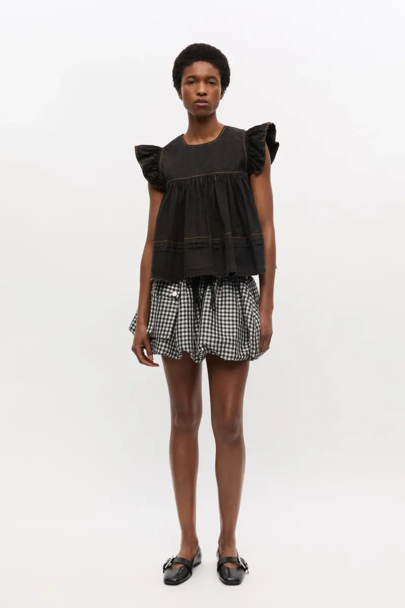 Zwarte gewassen katoenen top