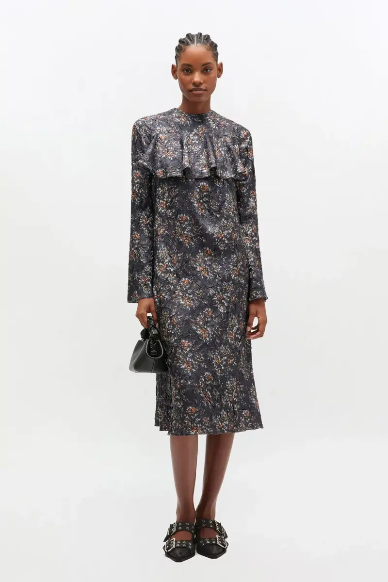 Zwarte jurk met bloemenprint en ruches